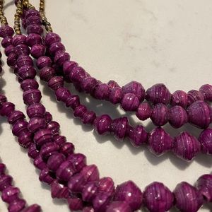 purple gold beaded noonday collection necklace